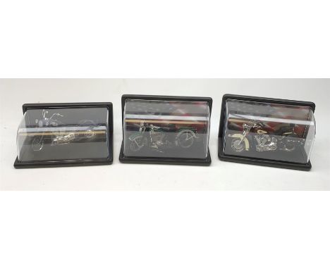 Three Franklin Mint die-cast models of Harley Davidson motorcycles comprising Blues Missile, Heritage Softail Classic and 193