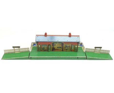 Hornby '0' gauge - three-piece Wembley Station fitted with electric lighting, tin printed building and speckled platforms, in
