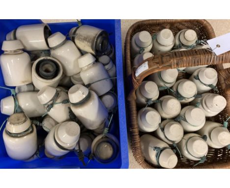 Fifty ceramic railway telegraph insulators of cylindrical form, some marked LNER, H12cm - Condition Report 
