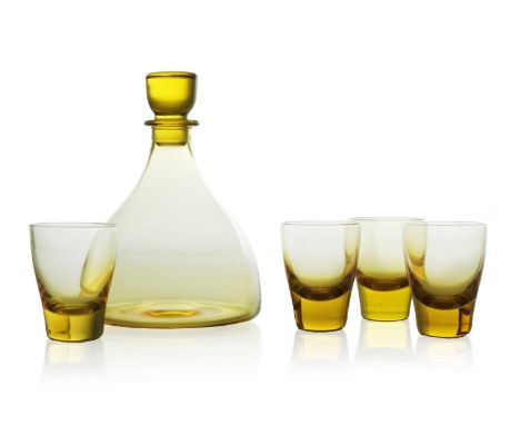 Barnaby Powell for James Powell and Sons, Whitefriars, an Art Deco amber glass sherry decanter and glasses, model M60 circa 1