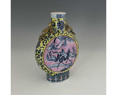 A Chinese porcelain moon flask, 19th Century, decorated in underglaze blue with yellow and pink enamels, depicting oriental f