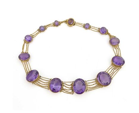 A Victorian amethyst and yellow metal necklace, circa 1860, the thirteen graduated facet cut stones in claw settings, united 