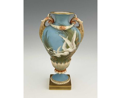 Charles Baldwyn for Royal Worcester, a twin handled vase,1899, double gourd pedestal urn form, acanthus moulded handles unite