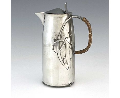 Archibald Knox for Liberty and Co., a Tudric Arts and Crafts pewter hot water jug, model 0231, tapered cylindrical form, cast