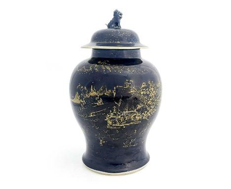 A Chinese blue ground temple jar and cover, inverse baluster form, decorated in the round with an extensive gilt landscape, d