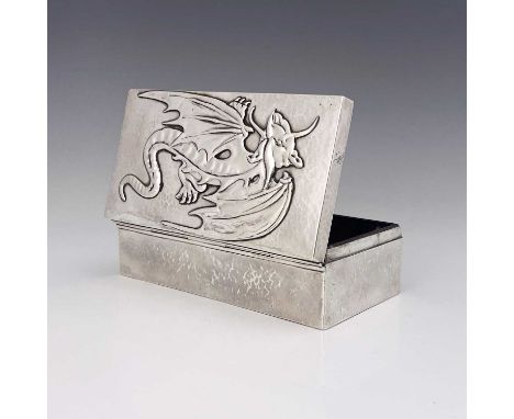 Sibyl Dunlop, an Arts and Crafts silver cigar box, London 1923, planished cuboid form, the hinged lid embossed in relief with