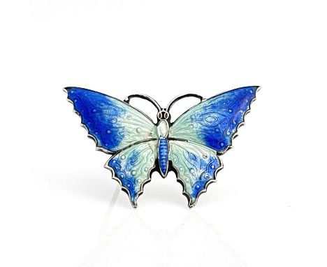 A George V silver gilt and enamelled butterfly brooch, C &amp; H, Birmingham 1918, the wings in basse taille enamel blue to p