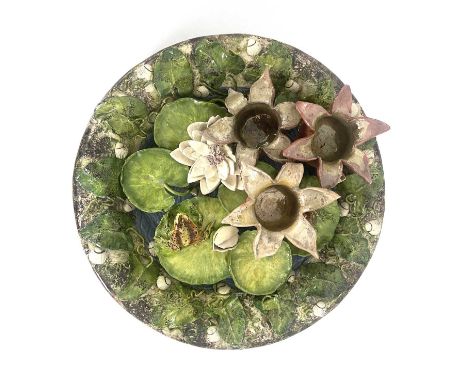 Christine Viennet, a large Palissy type relief moulded charger, 2000, modelled in relief as a pond encrusted with waterlilies