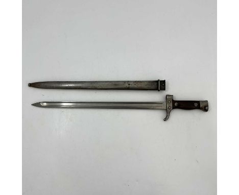 A late 19th century French M1892 Mannlicher Berthier sword bayonet, two piece wooden grip and quillon, housed in steel scabba