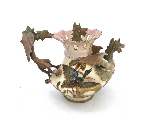 Alfred Stellmacher, an Amphora figural teapot, circa 1885, blush ivory ground baluster form with dragon handle, spout and fin
