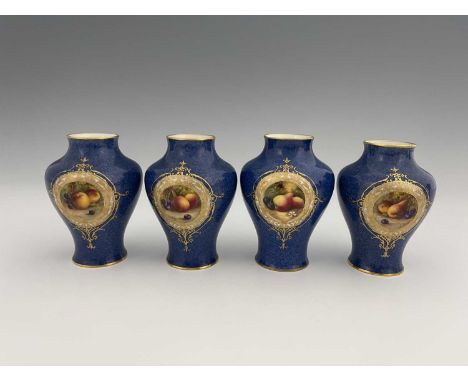 A set of four Royal Worcester fruit painted vases, circa 1938, baluster form, decorated with fruit on moss covered ground wit