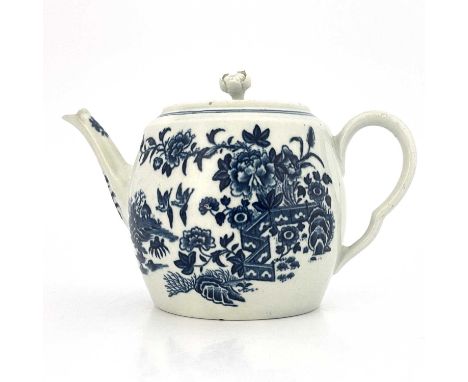 A Worcester blue and white teapot, crescent mark, circa 1770, transfer printed in the Fence pattern, barrel form with floral 