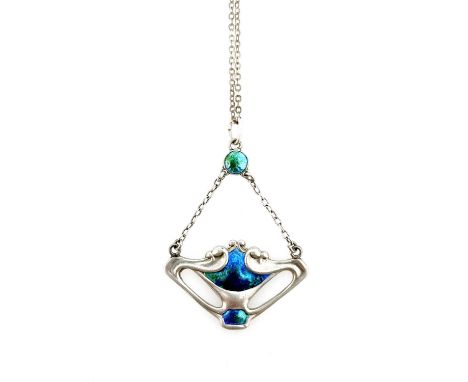Charles Horner, an Arts and Crafts silver and enamelled pendant, Chester 1909, the open whiplash tendril shield form plaque w