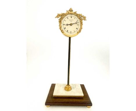 Thwaites &amp; Reed, London, a limited edition interpretation of an 18th Century brass rack clock, 1973, No.094/500, pineappl