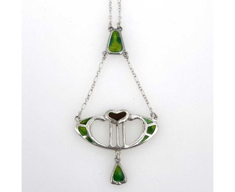 Charles Horner, an Arts and Crafts silver and enamelled pendant, Chester 1906, the squat lyre form plaque with red enamel hea
