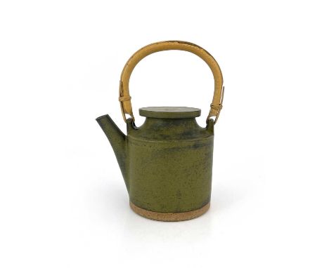 Robin Welch (British, 1936- 2019), a stoneware teapot with a cane handle, impressed maker's mark near the base of the piece (