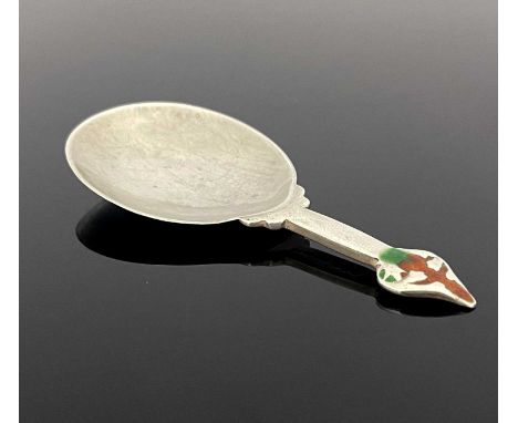 Archibald Knox for Liberty and Co., an Arts and Crafts silver and enamelled caddy spoon, Birmingham 1902, model 3209, the egg