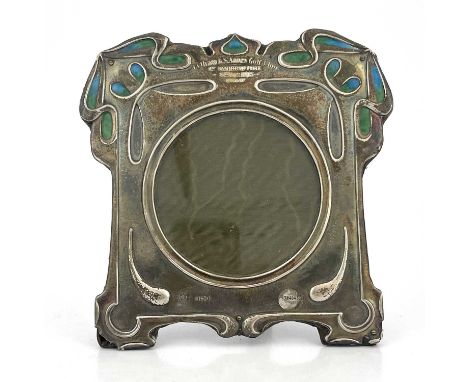 Kate Harris for William Hutton, an Arts and Crafts silver photo frame, London 1902, square bracket form embossed with knotted