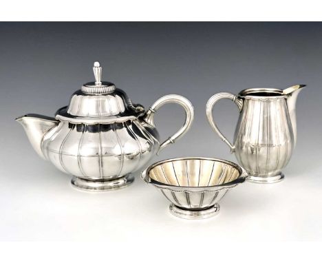 Johan Rohde (attributed) for WMF, a Jugendstil silver plated three piece tea set, circa 1912, lobed baluster form, with evert