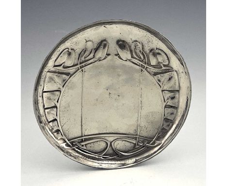 Archibald Knox for Liberty and Co., a Tudric Arts and Crafts pewter plate, model 0231, circular form, cast in relief with kno