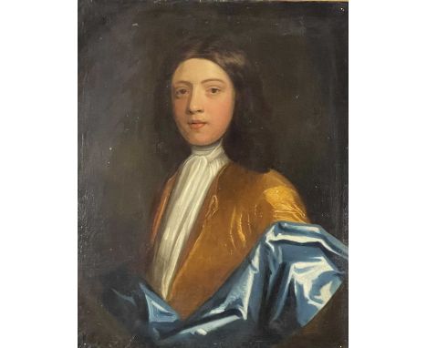 Circle of Sir Godfrey Kneller, portrait of a gentleman, half-length wearing a white stock, gold tunic, and a blue silk wrap, 
