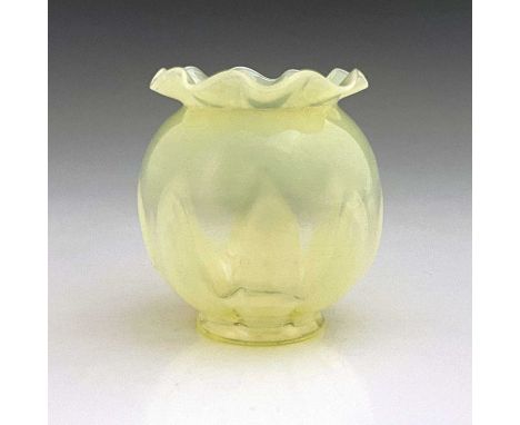 A small Arts and Crafts straw opal glass light shade, spherical poppy head form with crimped rim, moulded lappets, 9.5cm high