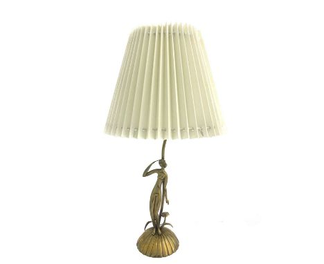 Karl Hagenauer, an Art Deco figural table lamp, circa 1940, modelled as a nude woman on a desert island with tree, looking ou
