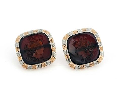 Alling &amp; Co., a pair of American Art Nouveau 14ct gold carnelian intaglio cufflinks, with bi-colour engraved surround, ma