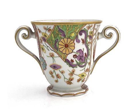 A Spode 287 pattern twin handled cup, circa 1810, footed form, painted with Japanese Kakiemon style design with chrysanthemum