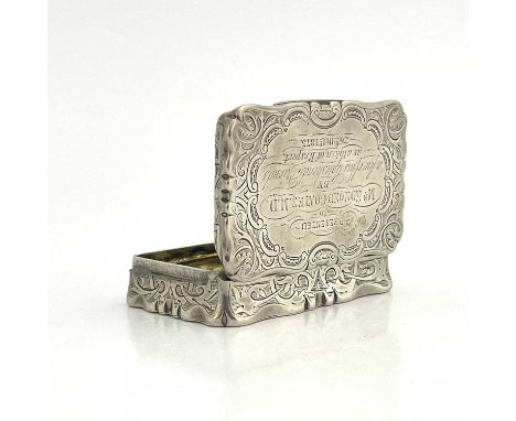 A Victorian silver snuff box, Frederick Marson, Birmingham 1874, castle top form, chased foliate scroll design, inscribed wit