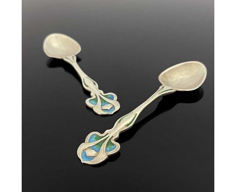 Kate Harris for William Hutton, a pair of Arts and Crafts silver and enamelled tea spoons, London 1903, the organic stylised 