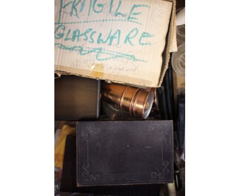 A box of magic related glassware, tricks etc, including Phantoma, 'The Haunted House Mystery', copper tumblers with soft ball