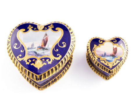 W E J Dean for Royal Crown Derby, two heart shaped boxes, each painted with a marine seascape within gilt cartouche, blue gro