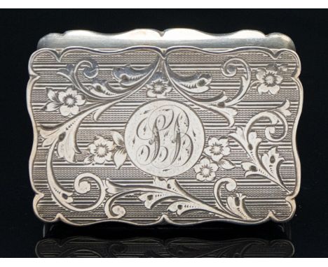 A Victorian silver snuff box, ogee border with engine turned and chased foliate and floral design, gilded to the interior, Jo