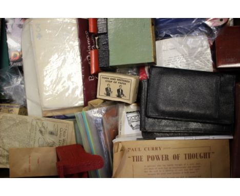Collection of vintage magic tricks, to include "Crystal Prediction One Ahead", "How to Bake a Cake" pop-up performance book, 