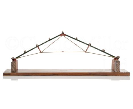 A TECHNICAL SCALE MODEL OF A ROOF TRUSS BY G. COUSENS LTD, MANCHESTER with green and red painted iron frame with wooden beam 