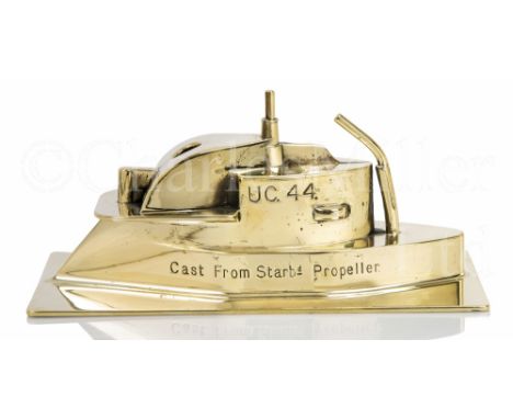 A RELIC FROM BRASS RECOVERED FROM THE WRECK OF S.M.S. U.C.-44, CIRCA 1917 modelled as a waterline conning tower of the submar