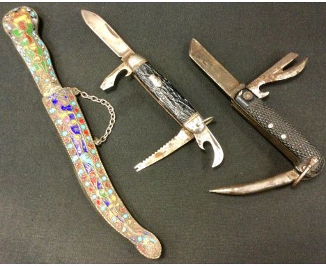 A 1940s British military issue three blade utility knife, 1941 issue arrow;  a pocket knife;  Persian knife with enameled hil