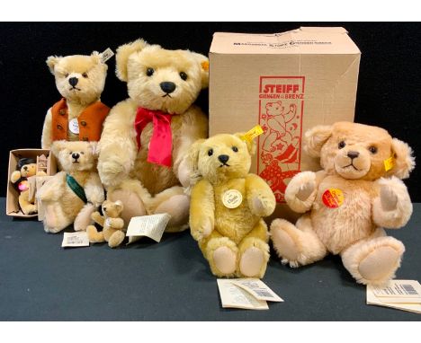 Steiff - a Steiff Classic 1909 jointed bear, red ribbon, 37cm long;  another, smaller, 24cm high;  Teddy Bu, 1925, 29cm high;