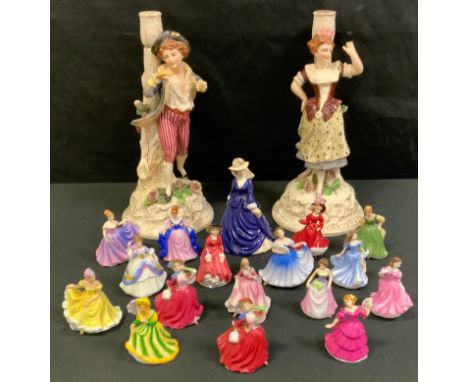 Six Royal Doulton miniature figures;  a pair of German figural candlesticks, c.1900;  etc 