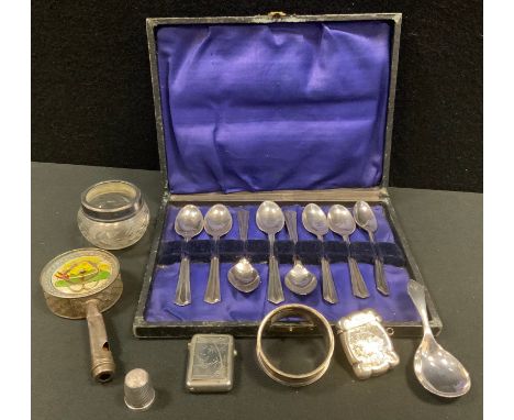 A silver vesta;  another, plated;  a silver caddy spoon, Sheffield 1895;  a silver thimble;  a set of six plated teaspoons;  