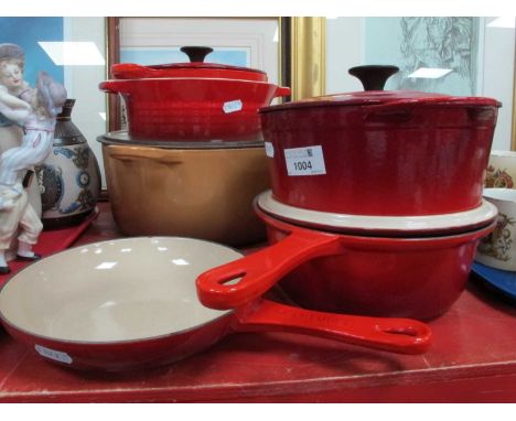 Le Creuset: Large circular lidded casserole (tan), medium pan, two lidded casseroles, skillet, and serving dish.Pan 20cm diam