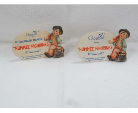 'Hummel Figurines' Oval Display Plaque, free standing, with boy to side, 9cm high 14.5cm wide, another 'Authorised Dealer' (2