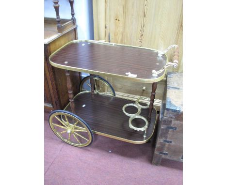 Vintage Drinks Trolly, with gilt effect galleries to twin trays, bottle apertures to the lower, approximately 71cm long.