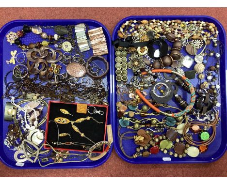 An Assortment of Costume Jewellery, in hues of brown, orange and gilt, to include shell bracelet, enamel inlaid necklace and 