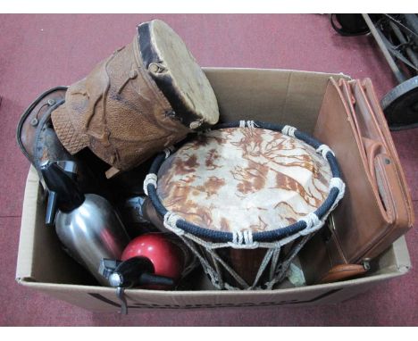 Leather Saddle, bongo drums, brief case, soda sprays:- One Box