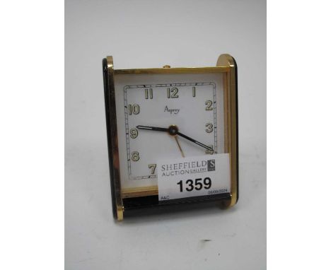 Asprey Travel Alarm Clock in black glass and brass, marked '2060 Swiss'.Lot 1359 - cannot confirm the clock is working