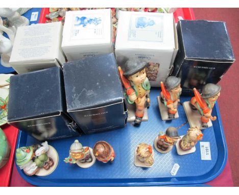Six Hummel Figurines, including 'Playmates', 'Little Tooteer' all boxed, together with three graduated bowler hat boys, unbox