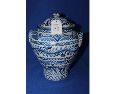 BLUE AND WHIT POTTERY JAR AND COVER and an art pottery vase (2)