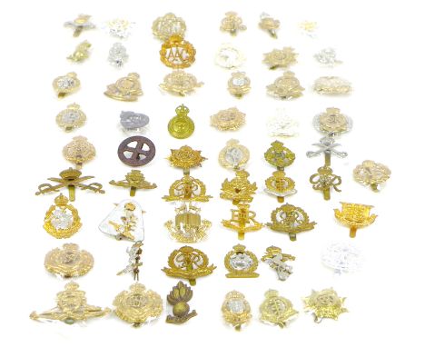 A collection of fifty five 20th century British Army with some replica badges, including Royal Army Medical Corp, Royal Milit